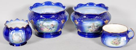 A set of Staffordshire ceramic planters in blue and white with scenes