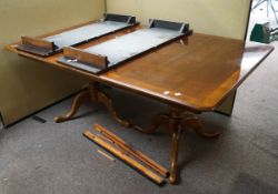 A 20th Century reproduction mahogany twin pedestal table. Measures; 76cm x 172cm x 112cm.
