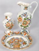 A set of painted Delft Polychroom Holland china to include; plate, jug and vase.