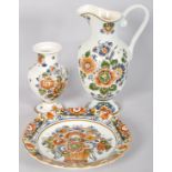 A set of painted Delft Polychroom Holland china to include; plate, jug and vase.