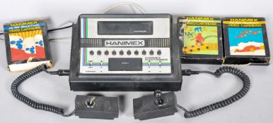 A Hanimex electronics TV Video games console and cartridges