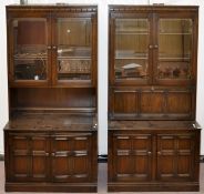 A pair of Ercol Old Colonial cabinets, width 98cm,