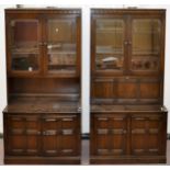 A pair of Ercol Old Colonial cabinets, width 98cm,