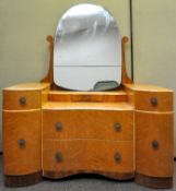 An early 20th Century birds eye maple dressing table and a spare mirror.