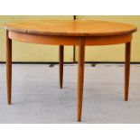 G Plan Fresco retro vintage teak wood round extending dining table. Measures; 73cm x 120cm diameter.