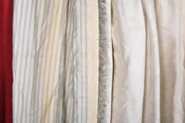 A pair of lined cream curtains