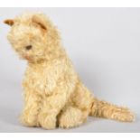 An early Merrythought mohair soft toy plush cat with glass eyes.
