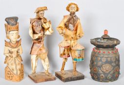 A Thai carved wood deity and a pair of oriental figures and a Nepal box