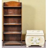 A painted trunk and an oak bookcase. Bookcase measures; 127cm high.