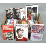 A box of Manchester United programmes, books and photos, some signed (Approx.