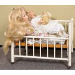 A Triang dolls cot,