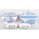 Two Quimper style plates along with two large blue and white willow pattern tureens both A/F.