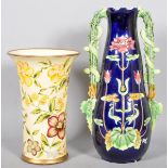 A large tube limed ceramic vase with enamel glazing along with another. Tallest measures; 44cm.