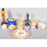 A collection of assorted ceramic items to include; ceramic lidded pots, part vanity set,