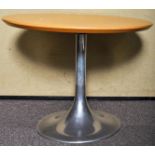 A contemporary coffee/centre table with aluminium tulip base