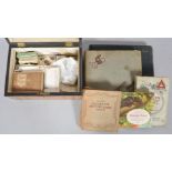 Box containing cigarette cards