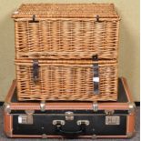Two wicker hampers and a suitcase