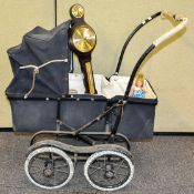 A 20th Century vintage dolls pram along with barometer