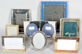 A collection of eight picture frames mostly all being silver plated in varying designs and sizes.