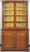 A mahogany bureau bookcase