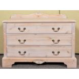 A limed pine chest of drawers having a run three drawers. Measures; 67cm x 104cm x 46cm.