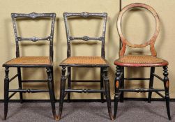 A pair of 19th Century ebonised salon/bedroom chairs having mother of pearl inlay