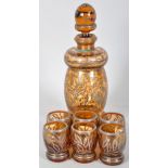 Argento Garantito 925/1000 amber glass decanter set with floral decorated silver overlay.