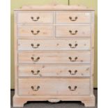 A Stag limed pine chest of drawers having a two over two over four graduating drawers.