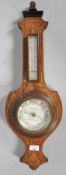 An Edwardian mahogany and inlay small barometer.