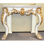 A marble topped console table having moulded gilt decoration,