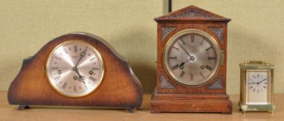 Three 20th Century clocks to include; oak pointed pediment mantel clock,