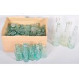 A collection of 19th / 20th Century glass medicinal bottles of varying shapes.