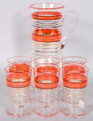 A 1950s retro vintage lemonade set comprising of a jug and six beakers