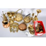 A group of assorted metalware to include a brass kettle and other items.