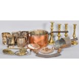 A collection of assorted metal ware to include a copper pan, brass candlesticks and other items.