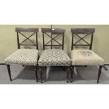 A set of three 19th century mahogany dining chairs with tapestry upholstered overstuffed seats,