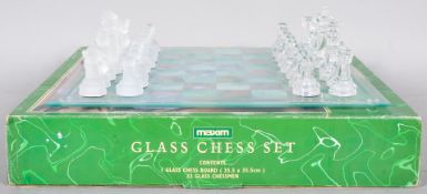 A Maxim boxed glass chess set