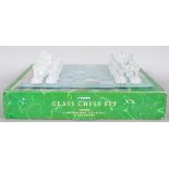 A Maxim boxed glass chess set