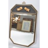 A contemporary ebonised and giltwood chinoiserie mirror, of octagonal section,