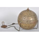 A brass hanging lamp with pierced decoration. Measures; 18cm diameter.
