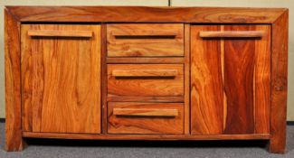 A contemporary African fruitwood sideboard credenza