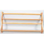 Lucian Ecrolani - Ercol - A 1960's retro vintage beech and elm wall mounted plate rack in the