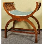 An Edwardian mahogany and inlay window seat/ dressing stool having a bowed seat