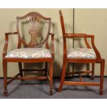 A pair of George III style mahogany shield back elbow chairs/carvers. Measures; 97cm tall.