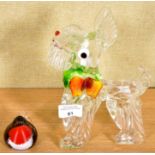 A glass dog and bird