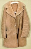 A Morlands sheepskin coat.