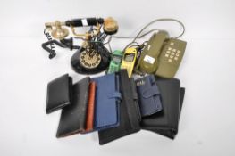 A group of telephones and other items