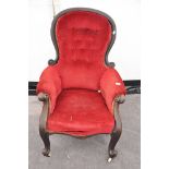 A Victorian mahogany over-stuffed armchair