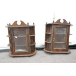 A pair of small glazed cabinets