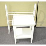A two tier white painted table together with a painted clothes horse